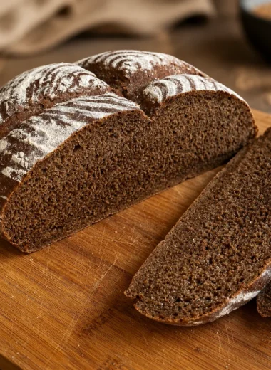 Freshly baked German rye bread loaf with a rich, aromatic flavor.