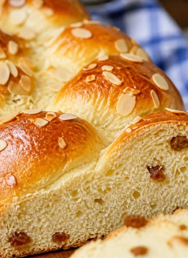 Authentic German Rosinenbrötchen, sweet yeast raisin buns fresh out of the oven.