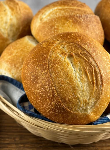 Traditional German Brötchen - crusty bread rolls perfect for breakfast and bratwurst.