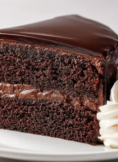 Delicious Sachertorte with apricot jam, a classic chocolate dessert